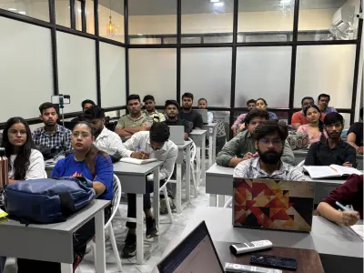 Students practicing on laptops